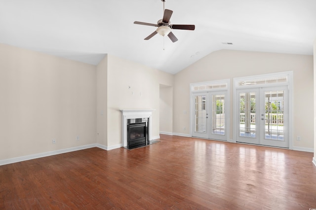 1537 Beaumont Way, Myrtle Beach, SC 29577 - unfurnished living room featuring wood finished floors, a fireplace with flush hearth, a ceiling fan, high vaulted ceiling, and baseboards