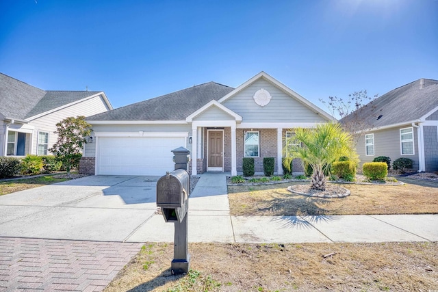 1537 Beaumont Way, Myrtle Beach, SC 29577 - view of front of home featuring a garage, brick siding, and concrete driveway