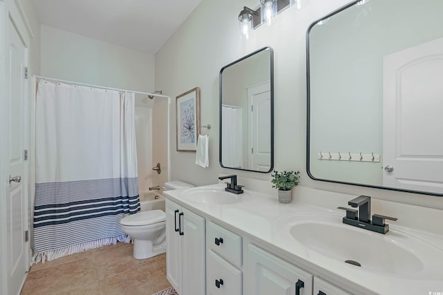 full bathroom featuring vanity, toilet, and shower / tub combo