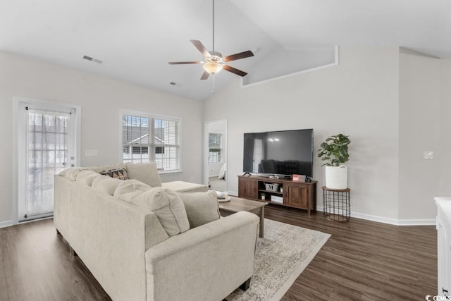 living room with baseboards, visible vents, a ceiling fan, dark wood-style flooring, and high vaulted ceiling