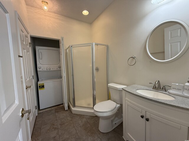3955 Gladiola Ct Unit 301, Myrtle Beach, SC 29588 - full bath with stacked washing machine and dryer, a stall shower, vanity, toilet, and recessed lighting