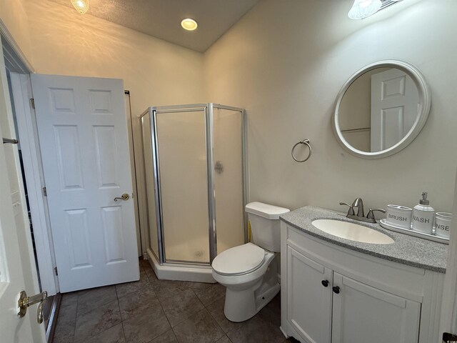 3955 Gladiola Ct Unit 301, Myrtle Beach, SC 29588 - bathroom featuring a shower stall, vanity, tile patterned floors, and toilet