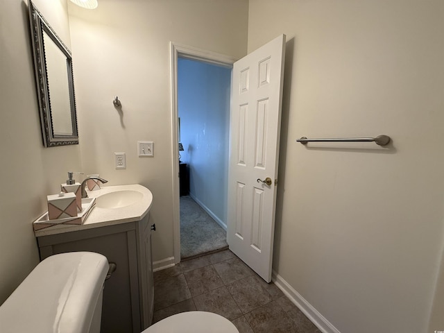 3955 Gladiola Ct Unit 301, Myrtle Beach, SC 29588 - bathroom featuring vanity, baseboards, toilet, and tile patterned floors