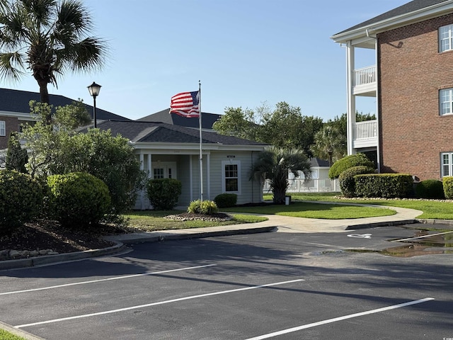 3955 Gladiola Ct Unit 301, Myrtle Beach, SC 29588 - view of building exterior featuring uncovered parking