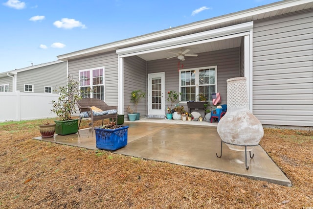 back of house featuring ceiling fan and a patio area