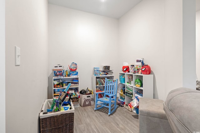 game room featuring hardwood / wood-style flooring