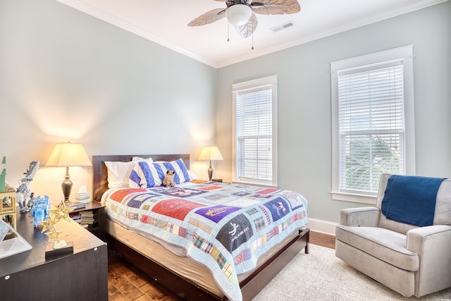 843 Howard Ave, Myrtle Beach, SC 29577 - bedroom featuring wood finished floors, crown molding, and a ceiling fan