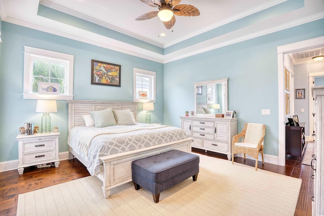 843 Howard Ave, Myrtle Beach, SC 29577 - bedroom with wood-type flooring, ornamental molding, a raised ceiling, and a ceiling fan