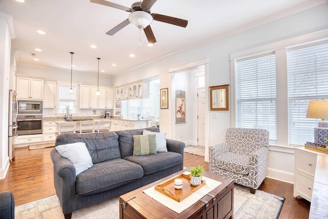 843 Howard Ave, Myrtle Beach, SC 29577 - living room featuring ornamental molding, wood finished floors, a ceiling fan, and recessed lighting