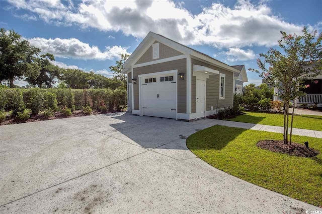 garage with a lawn