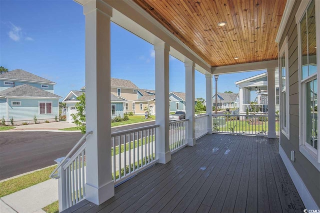 wooden terrace featuring a porch