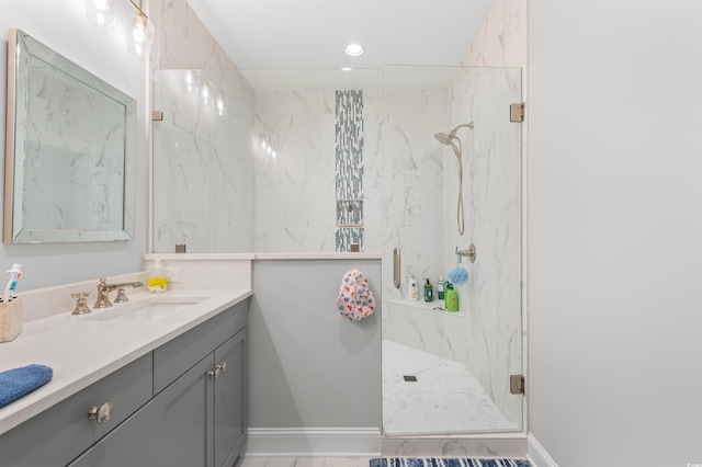 bathroom featuring vanity and walk in shower