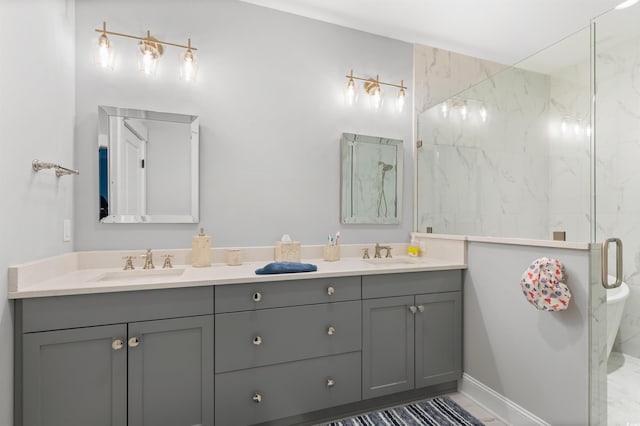 bathroom with vanity and a shower with shower door