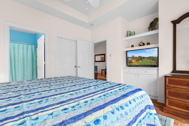 bedroom with hardwood / wood-style floors