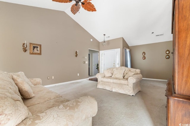 living room featuring light carpet, visible vents, baseboards, a ceiling fan, and high vaulted ceiling