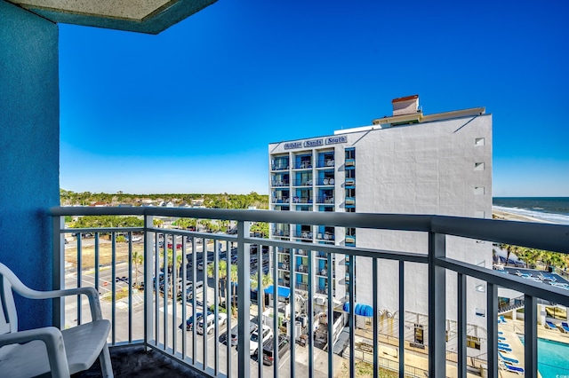 balcony featuring a water view