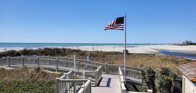 property view of water featuring a beach view