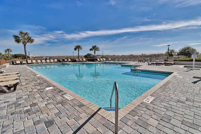 community pool with a patio