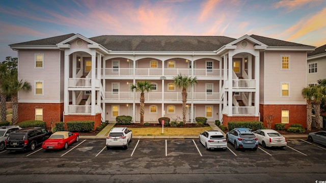 view of outdoor building at dusk