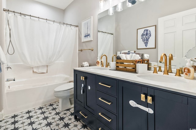 full bathroom with vanity, shower / tub combo with curtain, and toilet