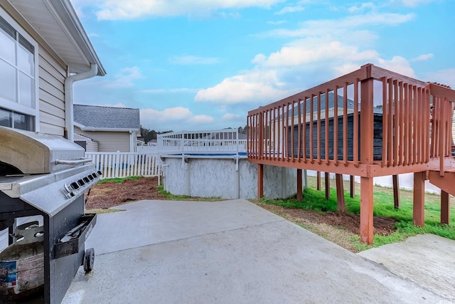 view of patio / terrace featuring a swimming pool side deck