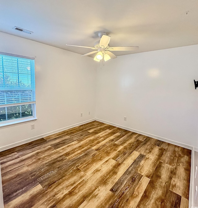 920 Leather Leaf Ln, Longs, SC 29568 - empty room with a ceiling fan, wood finished floors, and baseboards