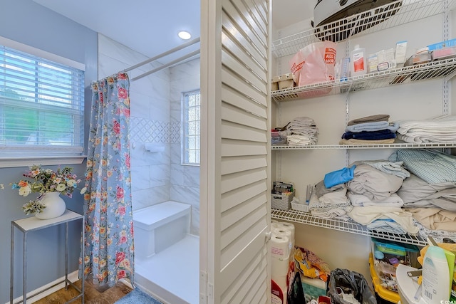 bathroom with curtained shower