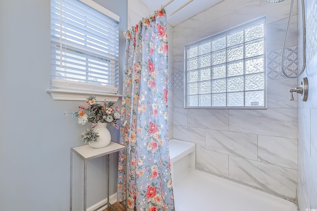 bathroom featuring a shower with curtain