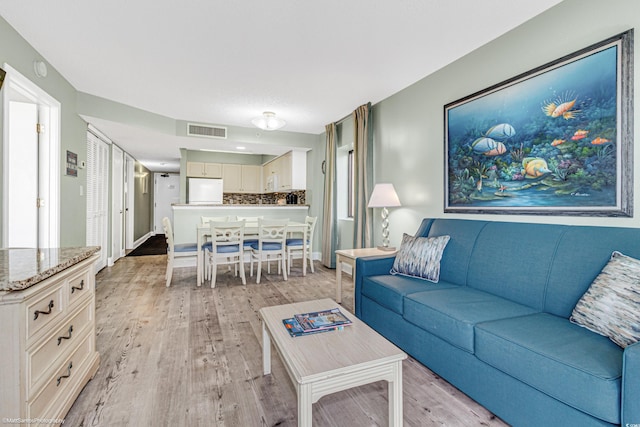 living room with light wood-type flooring