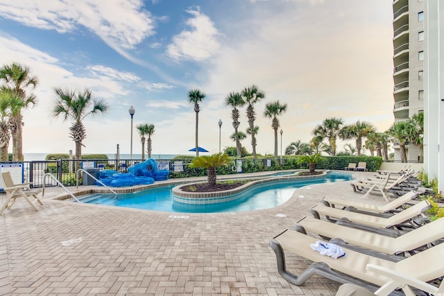 view of swimming pool featuring a patio