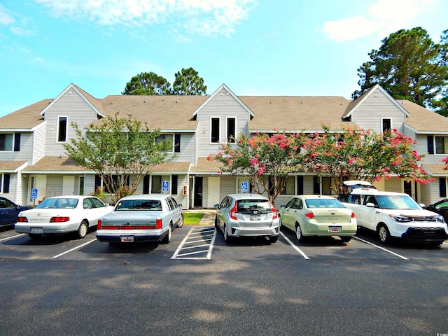 view of front of property with uncovered parking