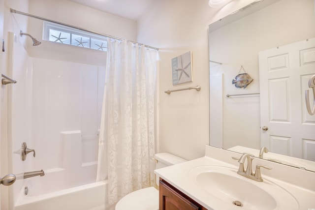 bathroom with shower / bath combo, visible vents, vanity, and toilet