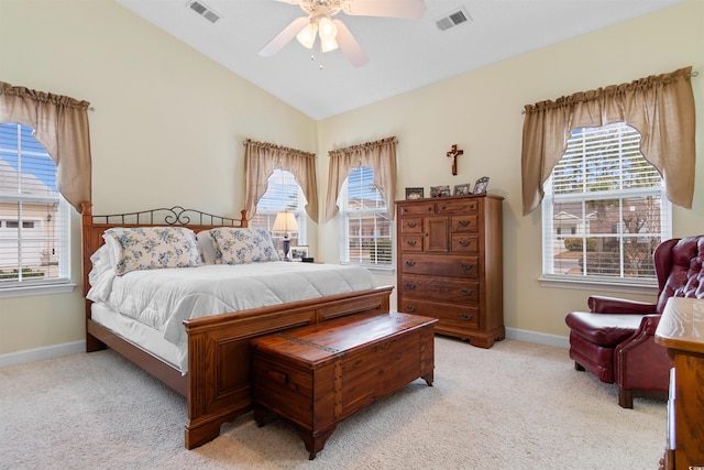 carpeted bedroom featuring lofted ceiling and ceiling fan