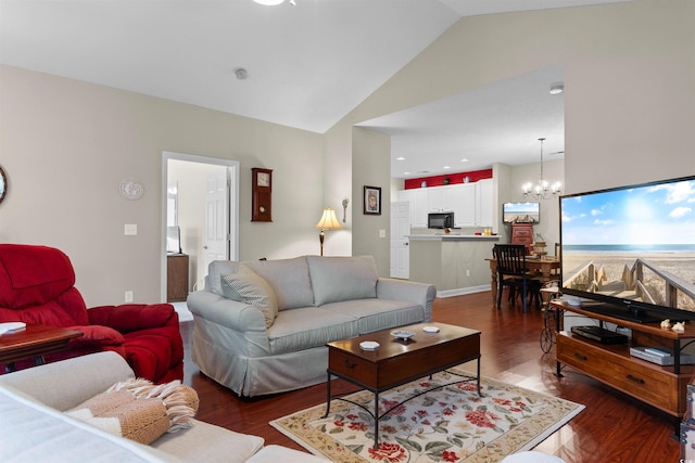 living room with an inviting chandelier, dark wood-type flooring, and high vaulted ceiling