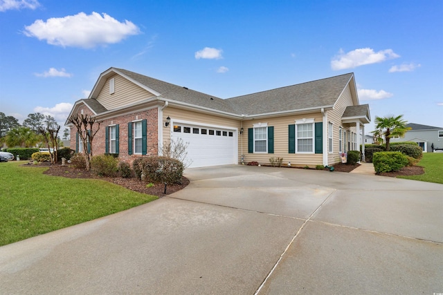 view of front of property with a garage and a front yard