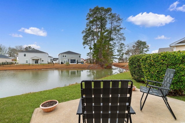 view of patio featuring a water view