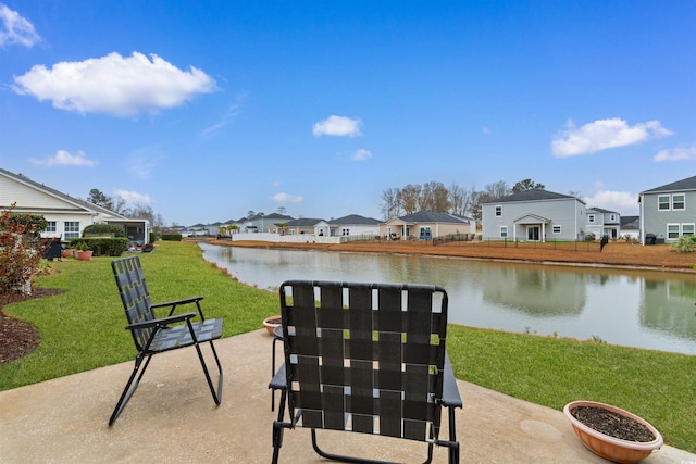 view of patio featuring a water view