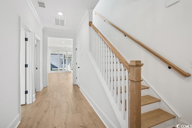 1800 Tryon Dr, Myrtle Beach, SC 29588 - stairs with crown molding, wood finished floors, baseboards, and recessed lighting