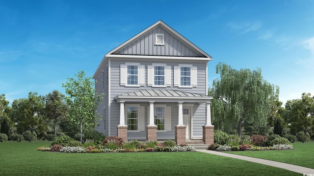 view of front of home with a front lawn and covered porch