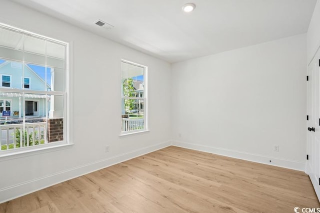 1800 Tryon Dr, Myrtle Beach, SC 29588 - empty room with light wood-style floors, baseboards, and recessed lighting