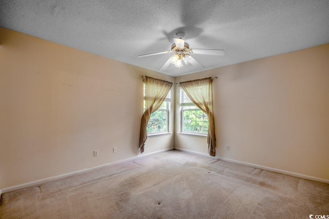 8545 Hopkins Cir Unit G, Myrtle Beach, SC 29575 - empty room with baseboards, carpet flooring, a textured ceiling, and ceiling fan