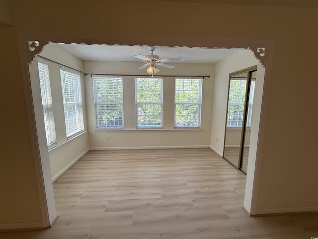 8545 Hopkins Cir Unit G, Myrtle Beach, SC 29575 - spare room with a ceiling fan, baseboards, and light wood finished floors