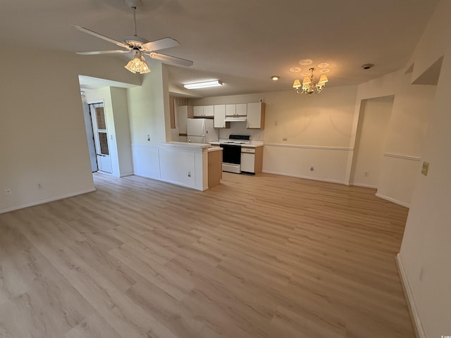 8545 Hopkins Cir Unit G, Myrtle Beach, SC 29575 - kitchen with open floor plan, light wood-type flooring, light countertops, a sink, and dishwasher