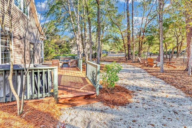 view of yard with a wooden deck