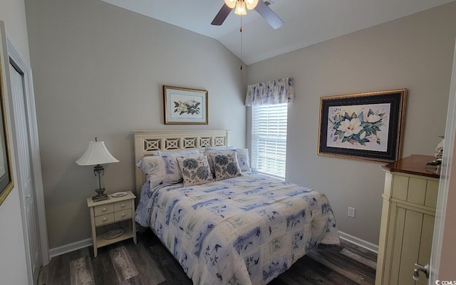 bedroom featuring lofted ceiling, dark wood-type flooring, and ceiling fan