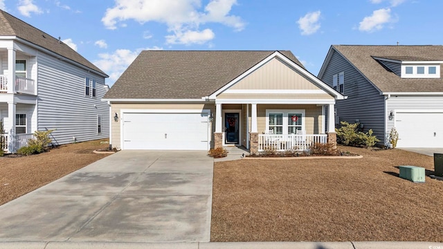 craftsman-style house with a porch and a garage