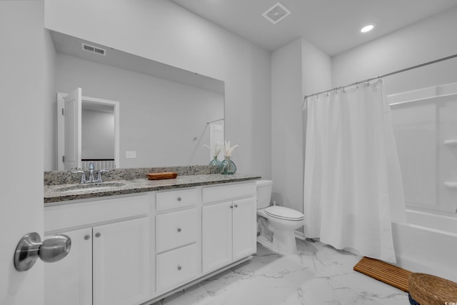 full bathroom with vanity, toilet, and shower / tub combo