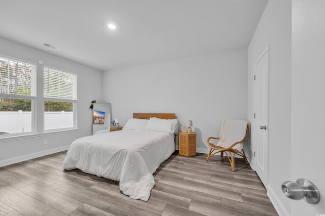 bedroom featuring light hardwood / wood-style flooring