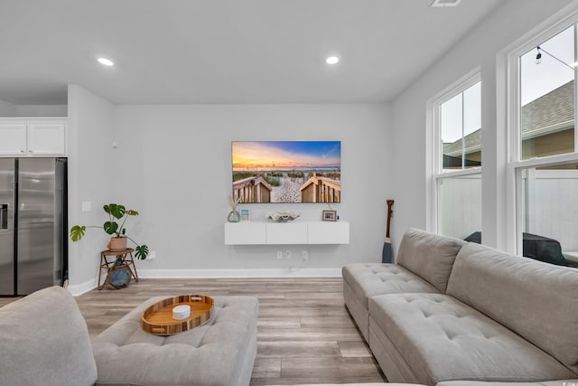 living room featuring light wood-type flooring