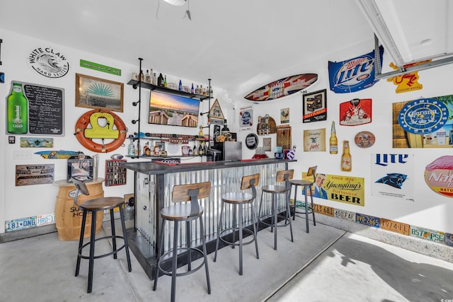 bar with concrete flooring